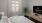 a bedroom with a large window