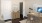 a room with a desk and computer