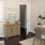 a room with a desk and computer