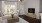 a living room with large windows