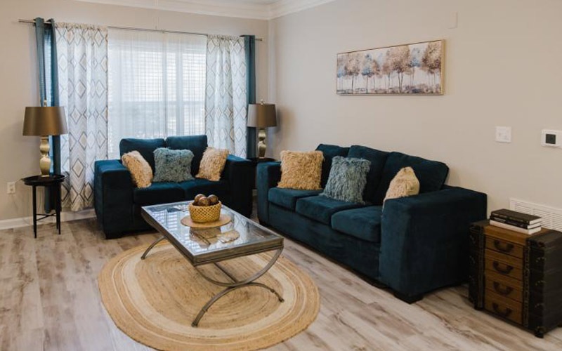 a living room with a couch and coffee table