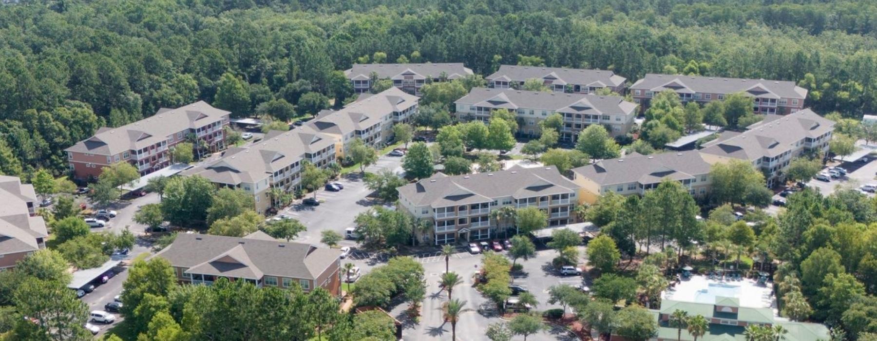 a group of buildings and trees